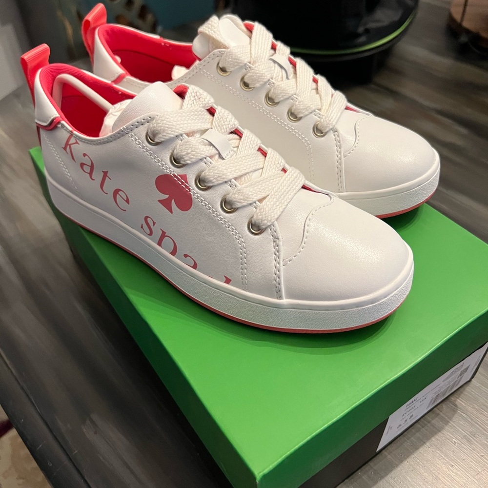 Kate Spade Nikki Sneakers in pink new in the box never worn